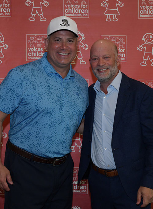 Voices For Children 2022 Golf Tournament:  VFC Board Chair Vince Castro and VFC Board Member Brad Meltzer