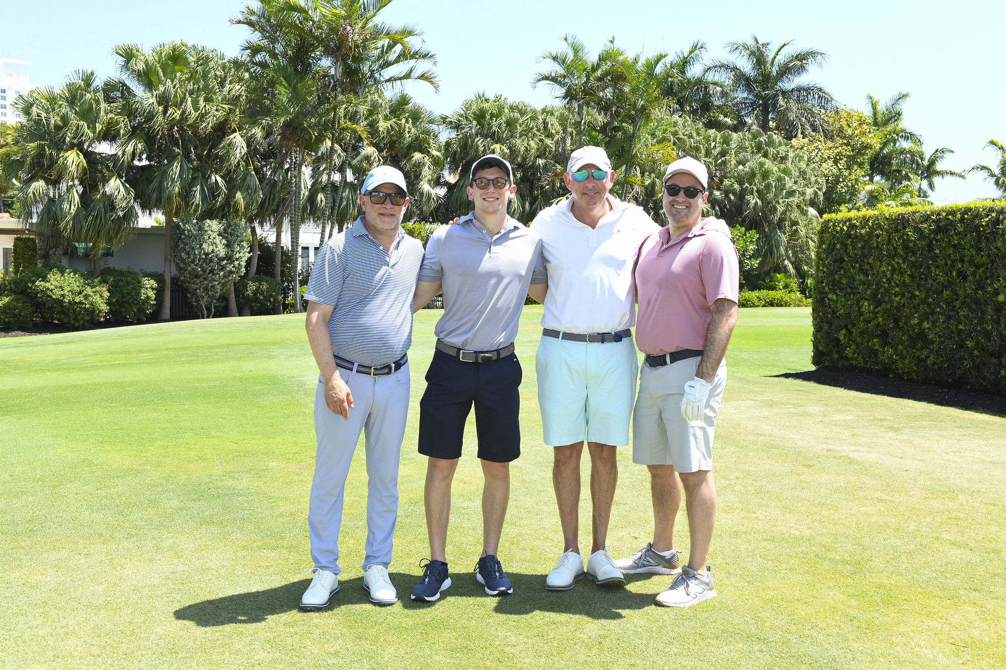 Brad Meltzer (left) with guests at the 2025 Voices For Children Golf Invitational