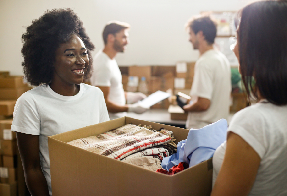 Volunteer collecting items